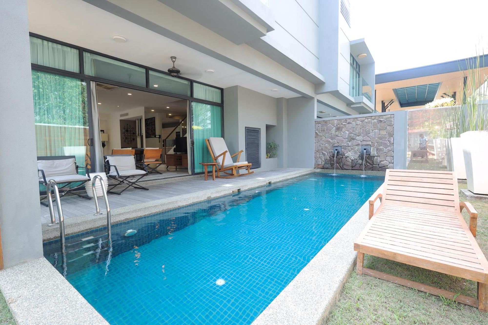 The Riyaz Lavanya Langkawi Pantai Cenang  Εξωτερικό φωτογραφία A pool at a private house