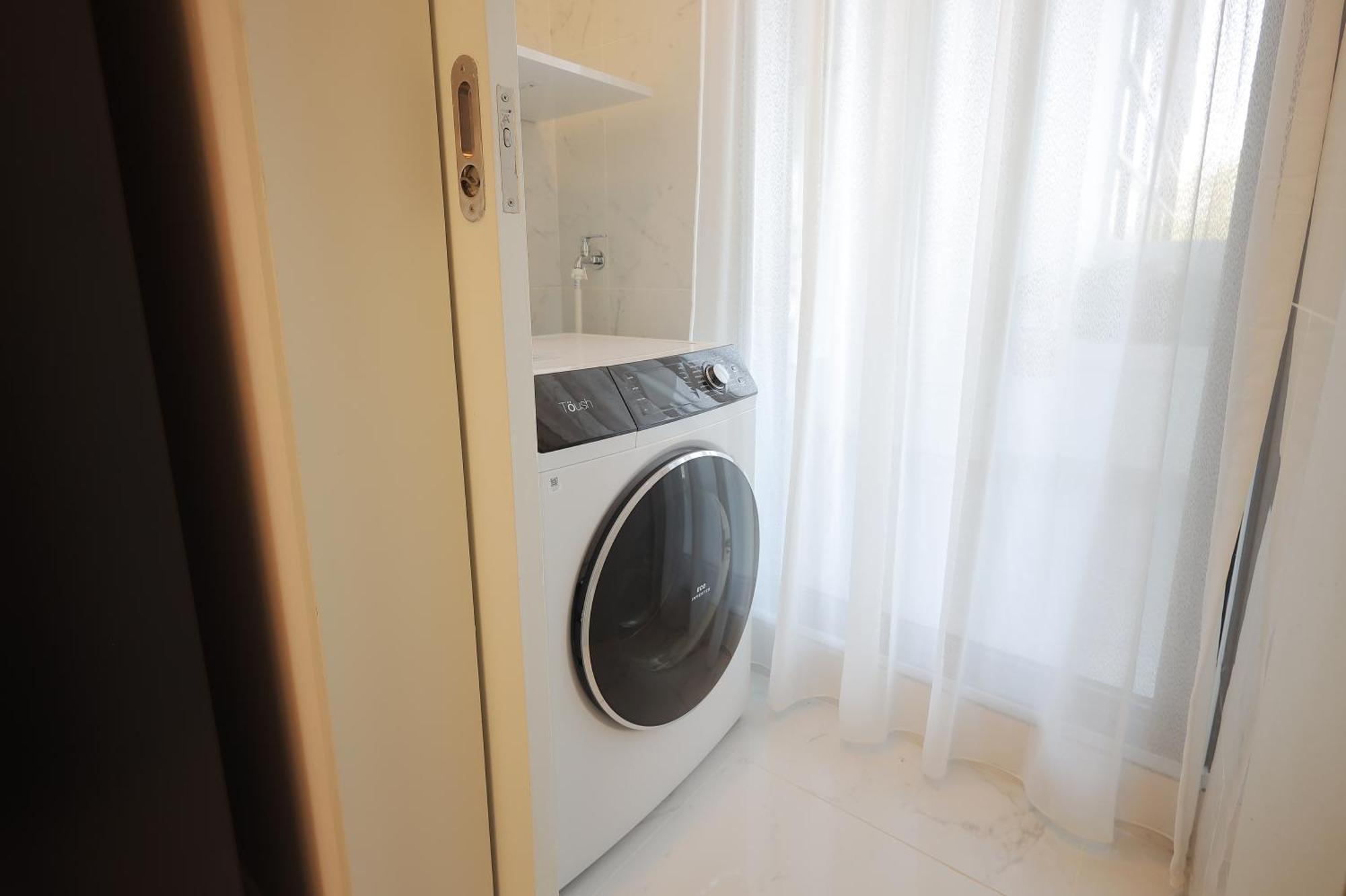 The Riyaz Lavanya Langkawi Pantai Cenang  Εξωτερικό φωτογραφία A washing machine